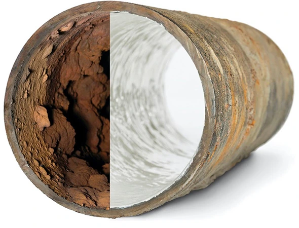 An image of a pipe filled with a brown material, showcasing trenchless pipe restoration techniques for effective maintenance.
